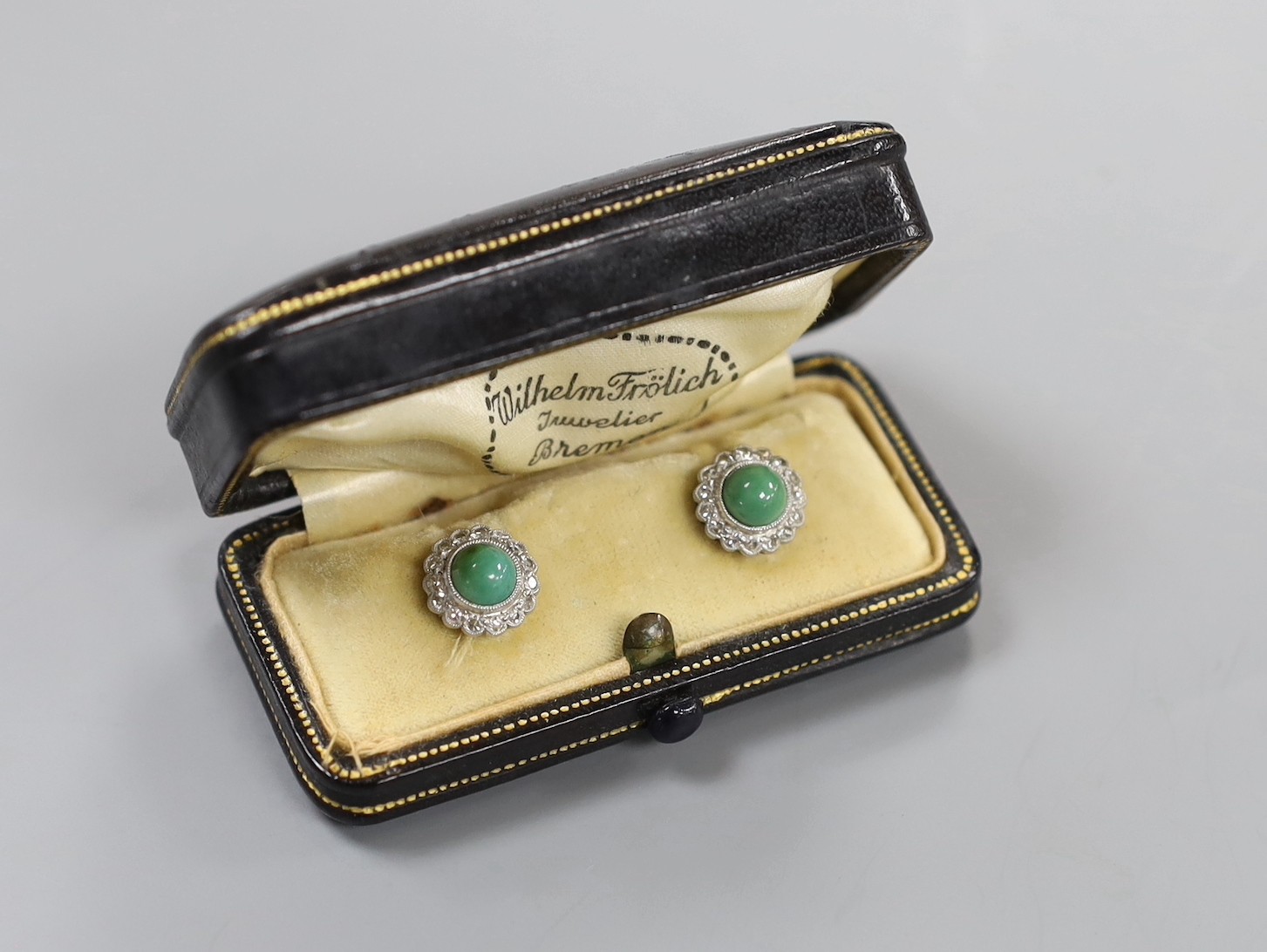 A pair of 14k, simulated jade and diamond cluster set ear studs, 10mm, gross weight 3 grams.